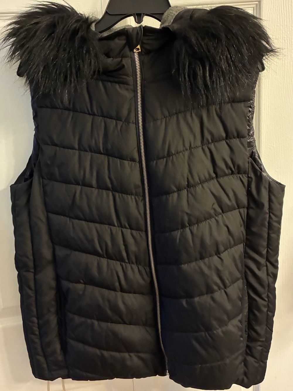 GAP Winter Vest. Black faux fur (thick)around neck of hood.  Great condition.MT